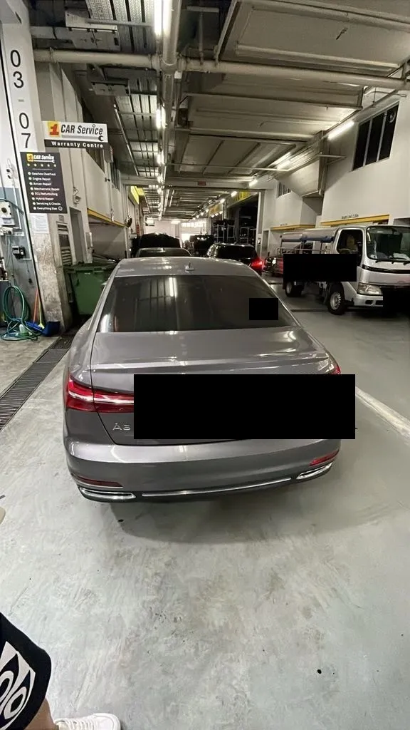 Audi A6 parked at the 1 Car Service workshop in Sin Ming AutoCity, Singapore