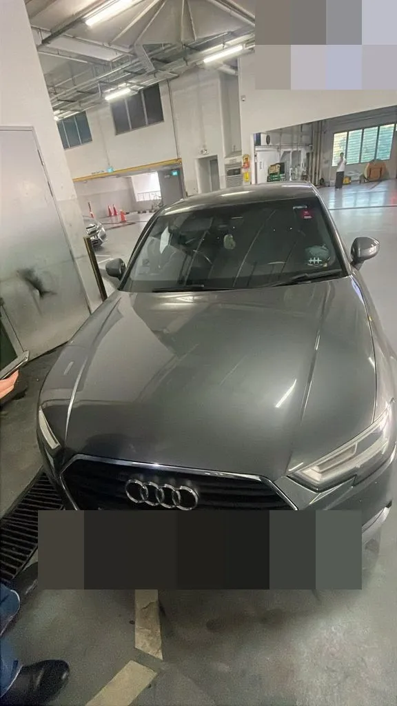 Audi on the lift at 1 Car Service Workshop during mechatronic unit replacement