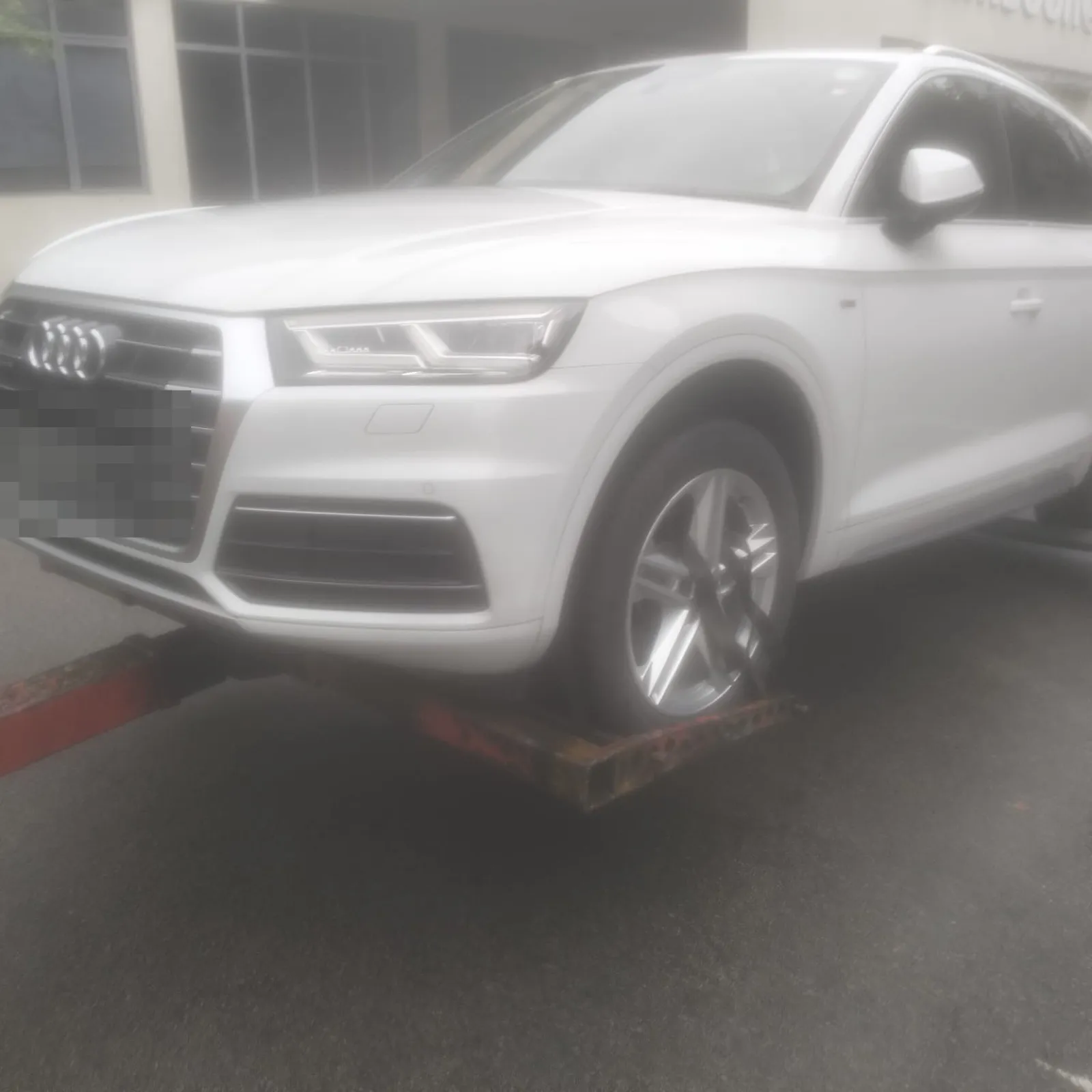 Audi Q5 SUV front view at our Singapore workshop
