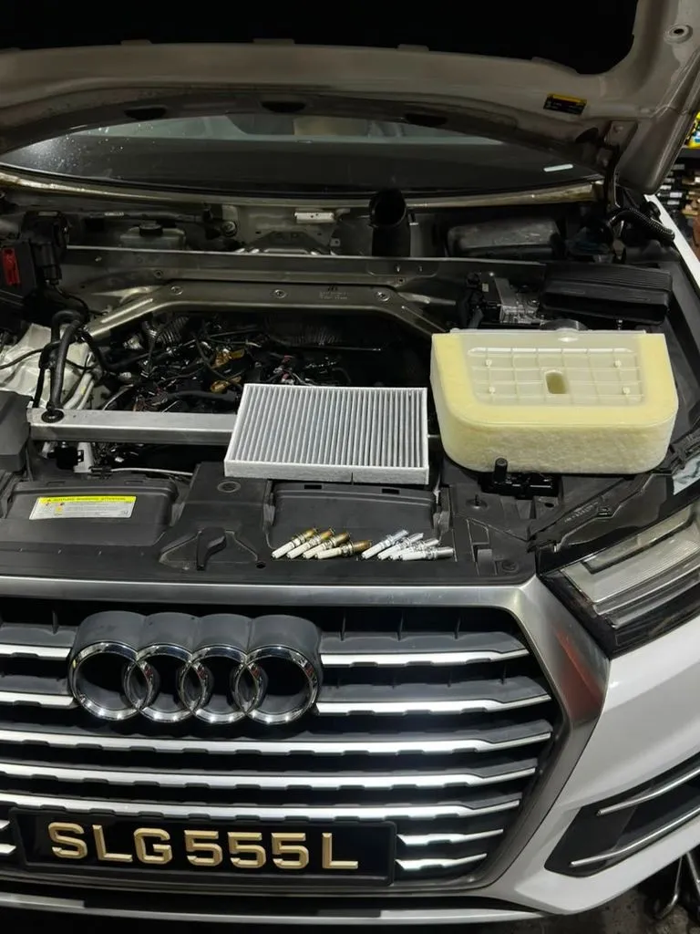New spark plugs for the Audi Q7 3.0 TFSI V6 ready for installation at our Singapore workshop