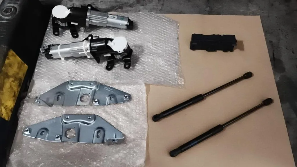 New Bentley Mulsanne rear boot electric motors, tailgate control unit, rear dampers and damper brackets laid out at our Singapore workshop