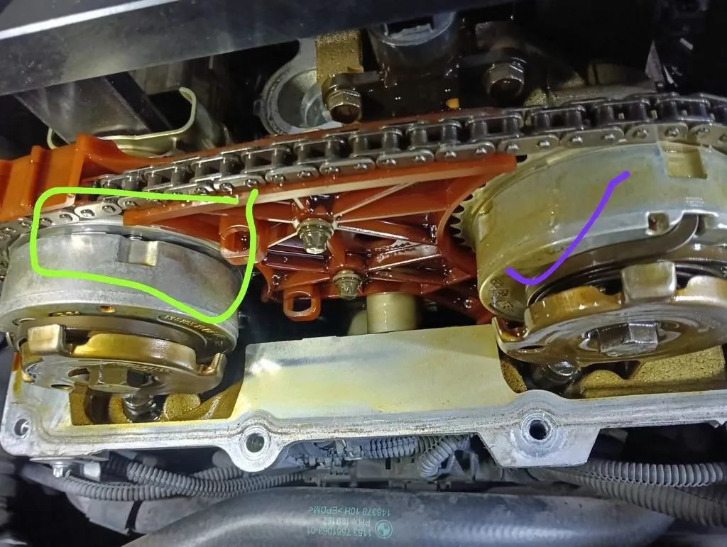 Worn cam gear and timing chain exposed on a BMW 523i N52 engine at our Singapore workshop