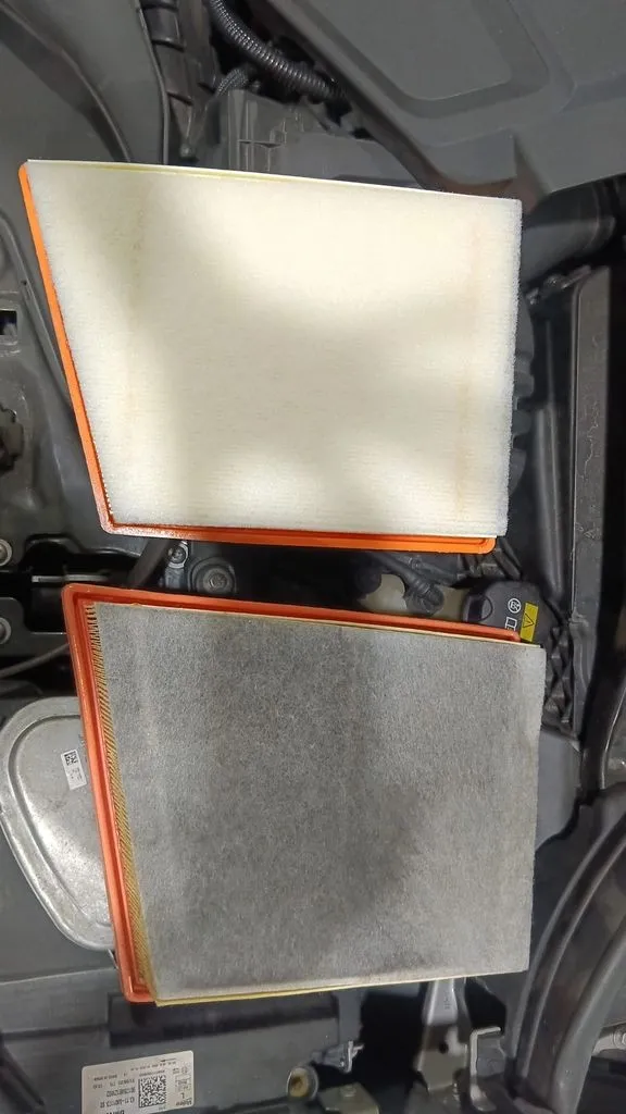 Old and new air filters from a BMW X1 major service at our Singapore workshop