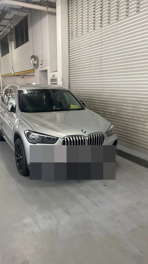 BMW X1 parked at our Sin Ming AutoCity workshop in Singapore