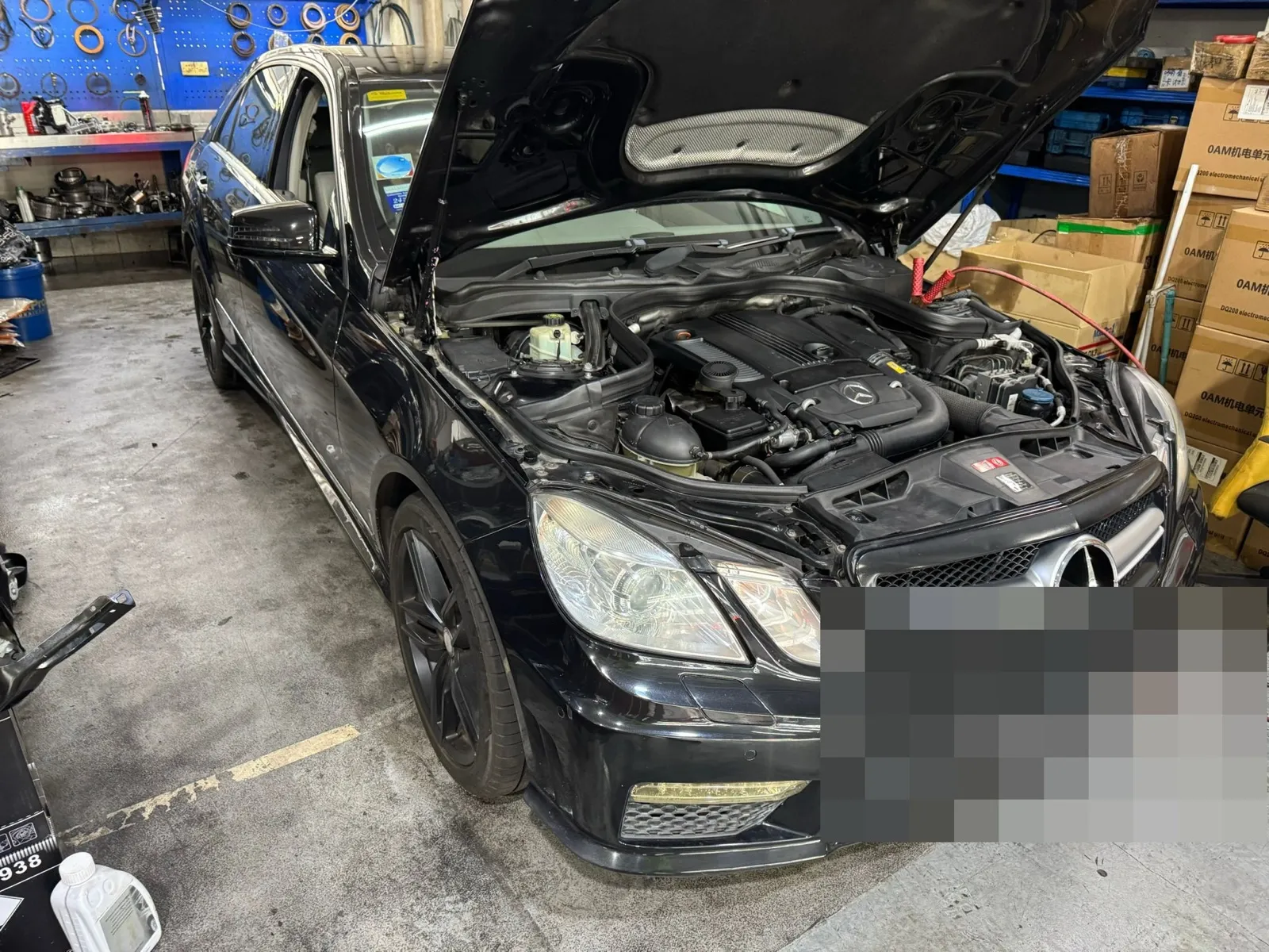 Engine bay open on a Mercedes-Benz in our Singapore workshop during a fuel system diagnosis