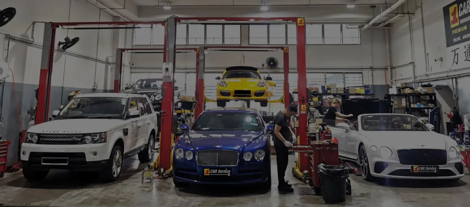 Continental cars in for servicing and maintenance inside our Sin Ming workshop in Singapore