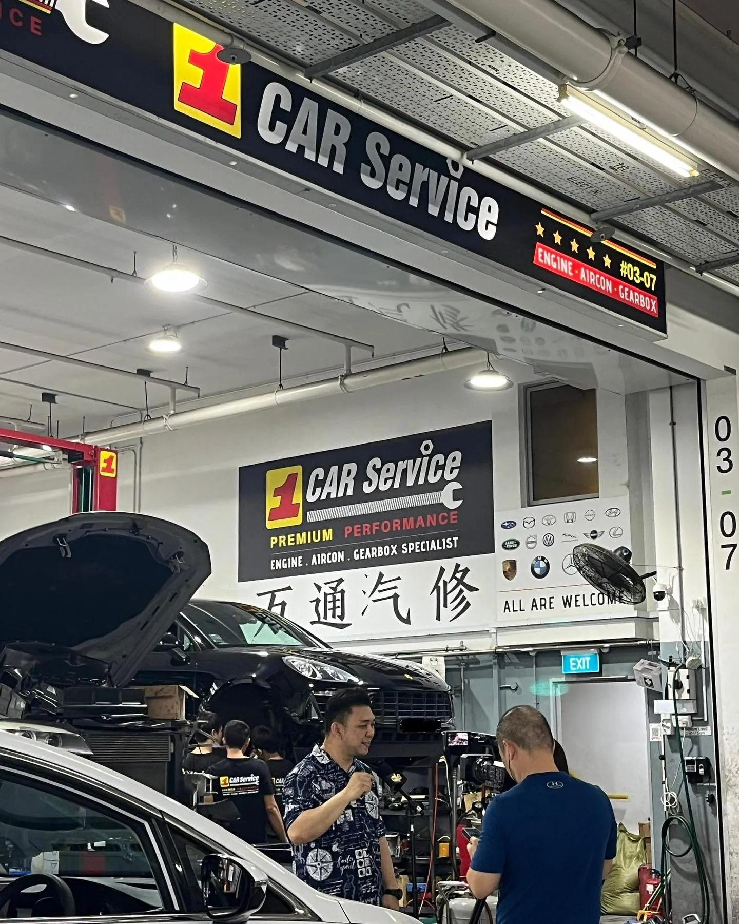 Our technicians at work inside the 1 Car Service workshop in Singapore