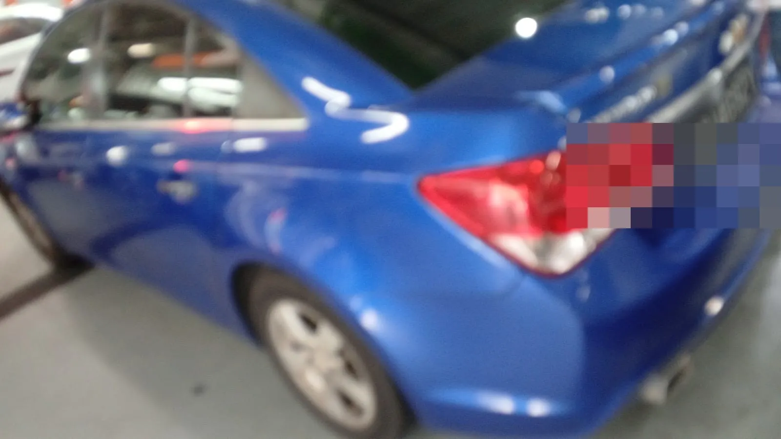 Chevrolet Cruze at our Singapore workshop for servicing.