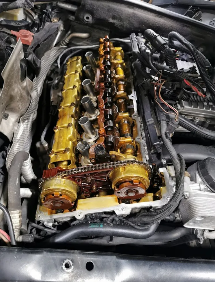 Engine cylinder head and timing components during an engine overhaul in Singapore