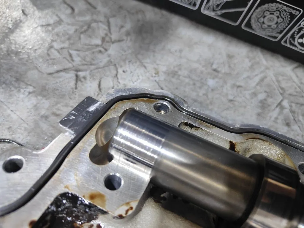 Ferrari 488 camshaft inspected for damage caused by loss of lubrication