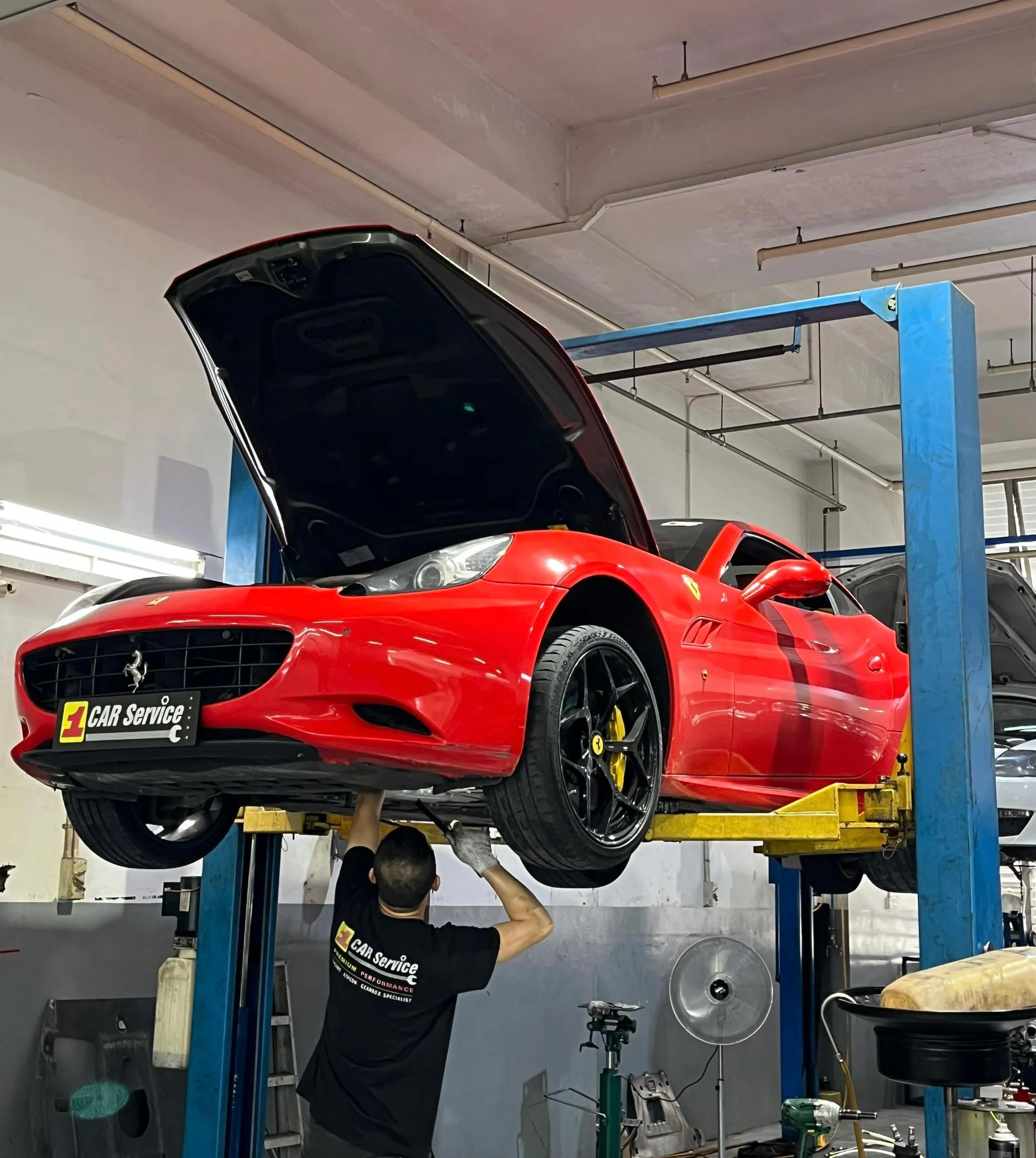 Ferrari in for specialist servicing and repair on the lift at our Sin Ming workshop in Singapore
