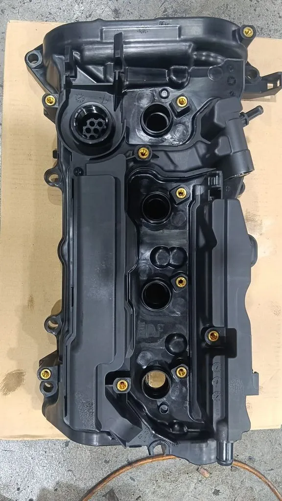New valve cover assembly ready to be fitted on a Honda Odyssey during oil seal repair in Singapore
