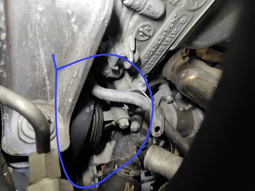 Engine bay of Mercedes-Benz A180 showing the fallen belt and jammed waterpump at 1 Car Service Workshop
