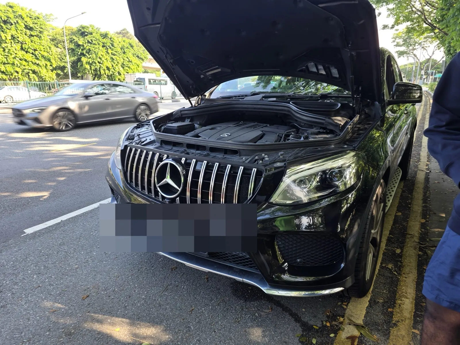Black Mercedes-Benz GLE Coupe being inspected at our Singapore workshop