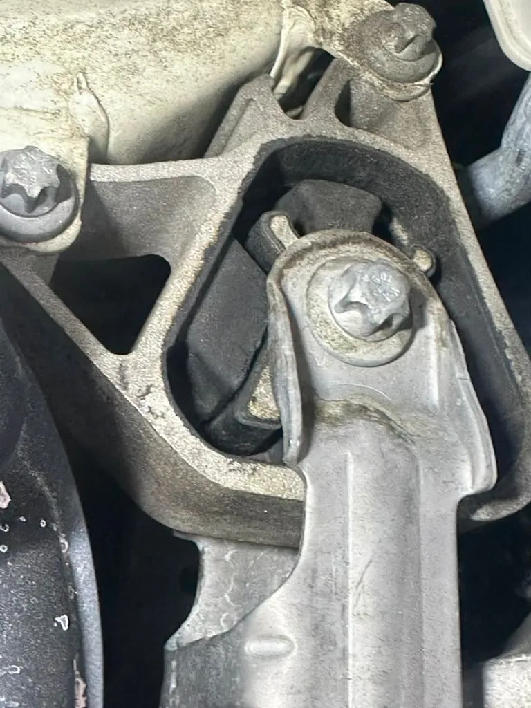 Worn engine mount from a Mercedes GLA showing deterioration, removed during a major service inspection at our Singapore workshop