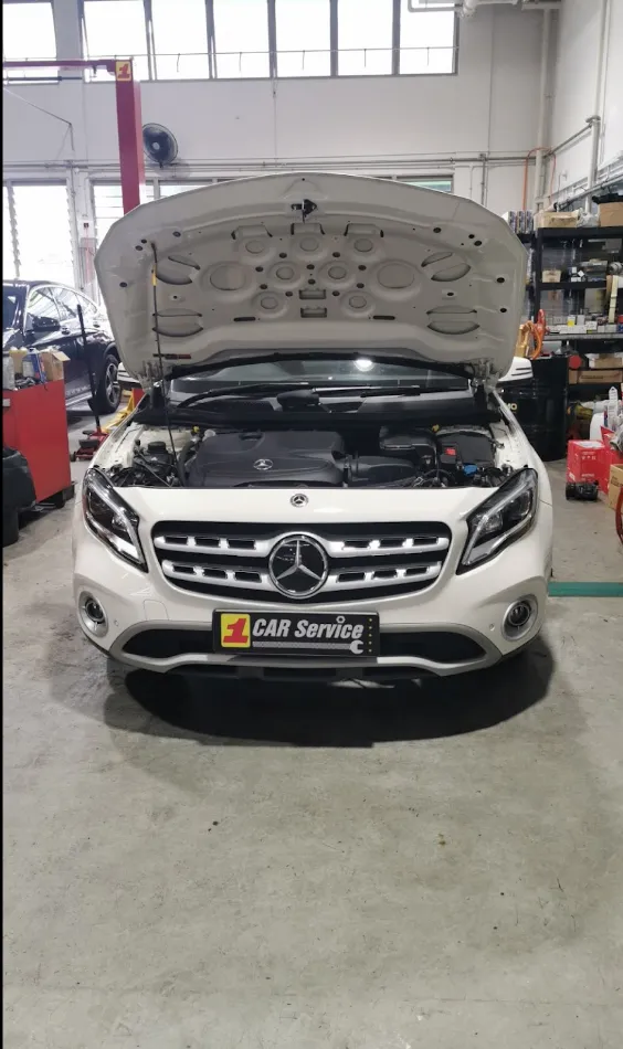 White Mercedes GLA in for servicing with the bonnet up at our Singapore workshop