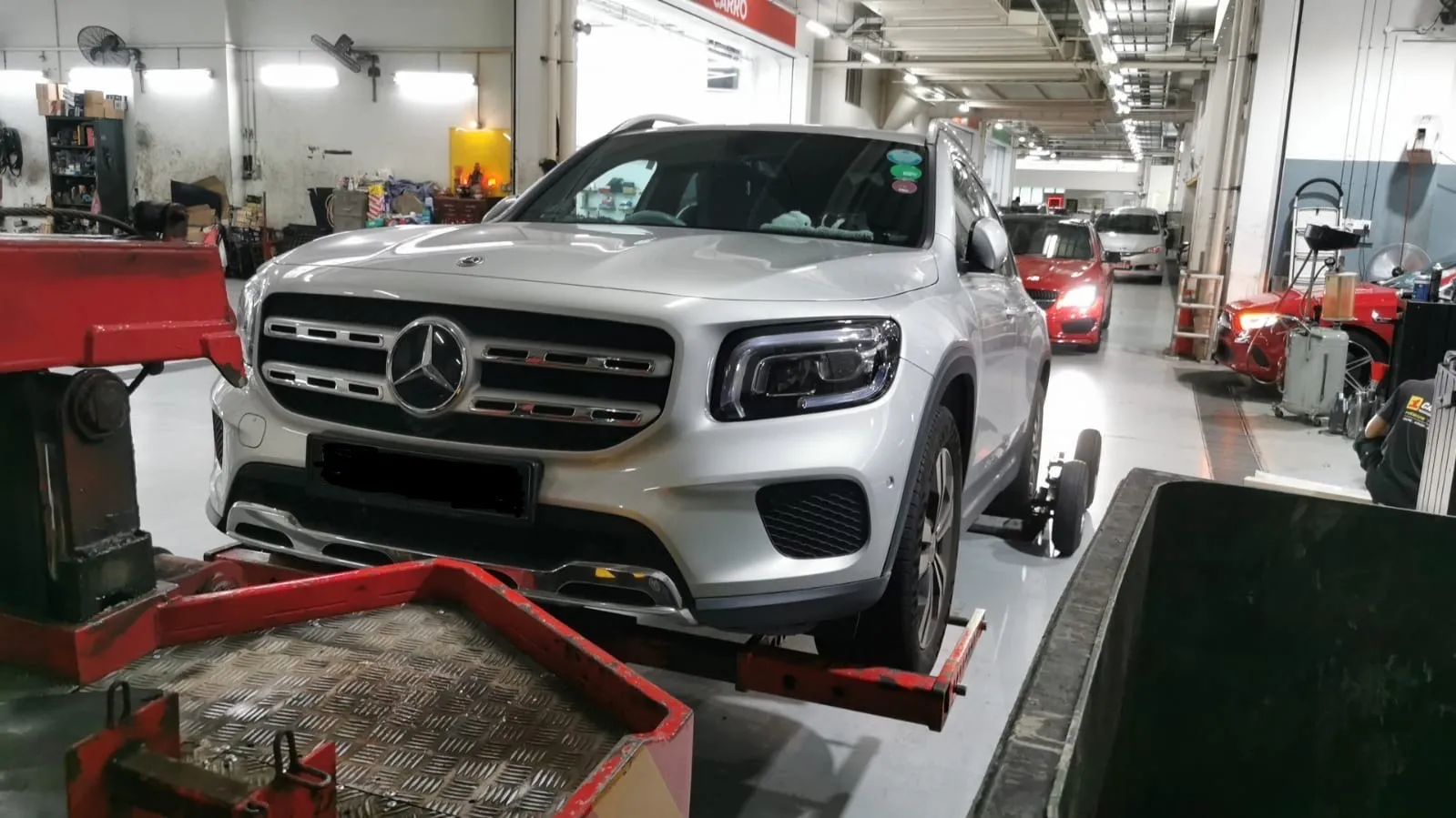 Silver Mercedes-Benz GLB 180 being towed into our Singapore workshop after the wrong fuel was put in