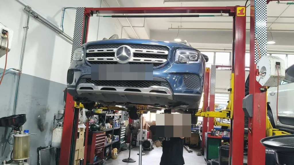 Blue Mercedes GLB 200 on the lift at our Singapore workshop for a steering rack replacement