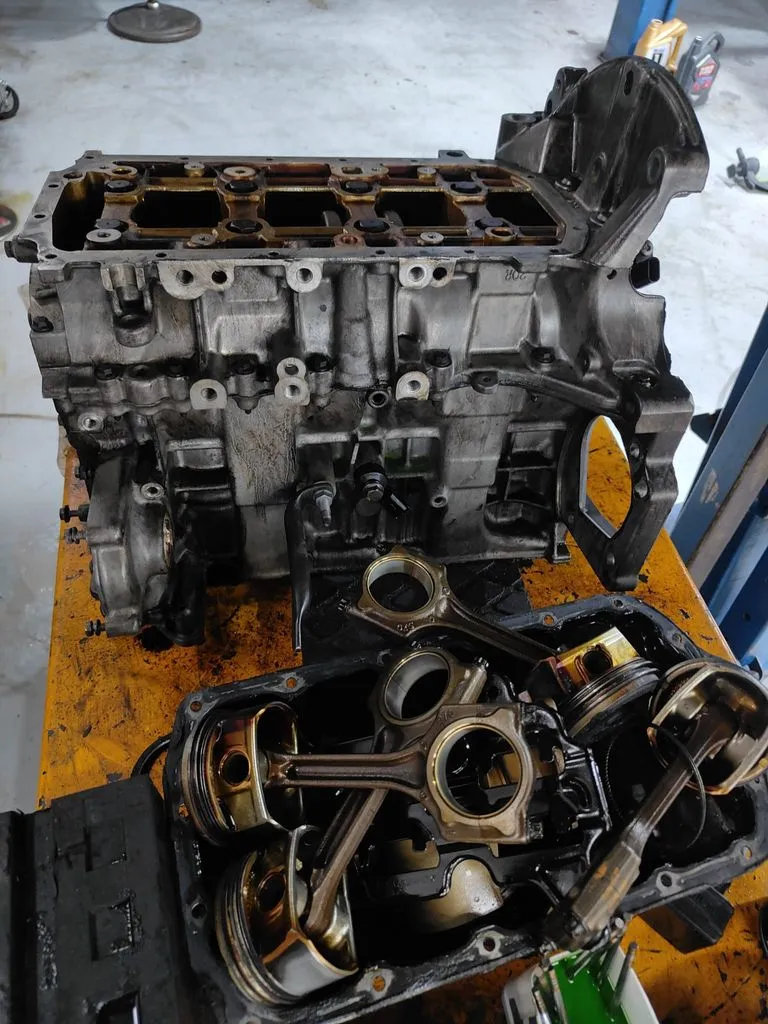 MINI Cooper S engine fully disassembled on the workshop bench at our Singapore workshop for an engine overhaul