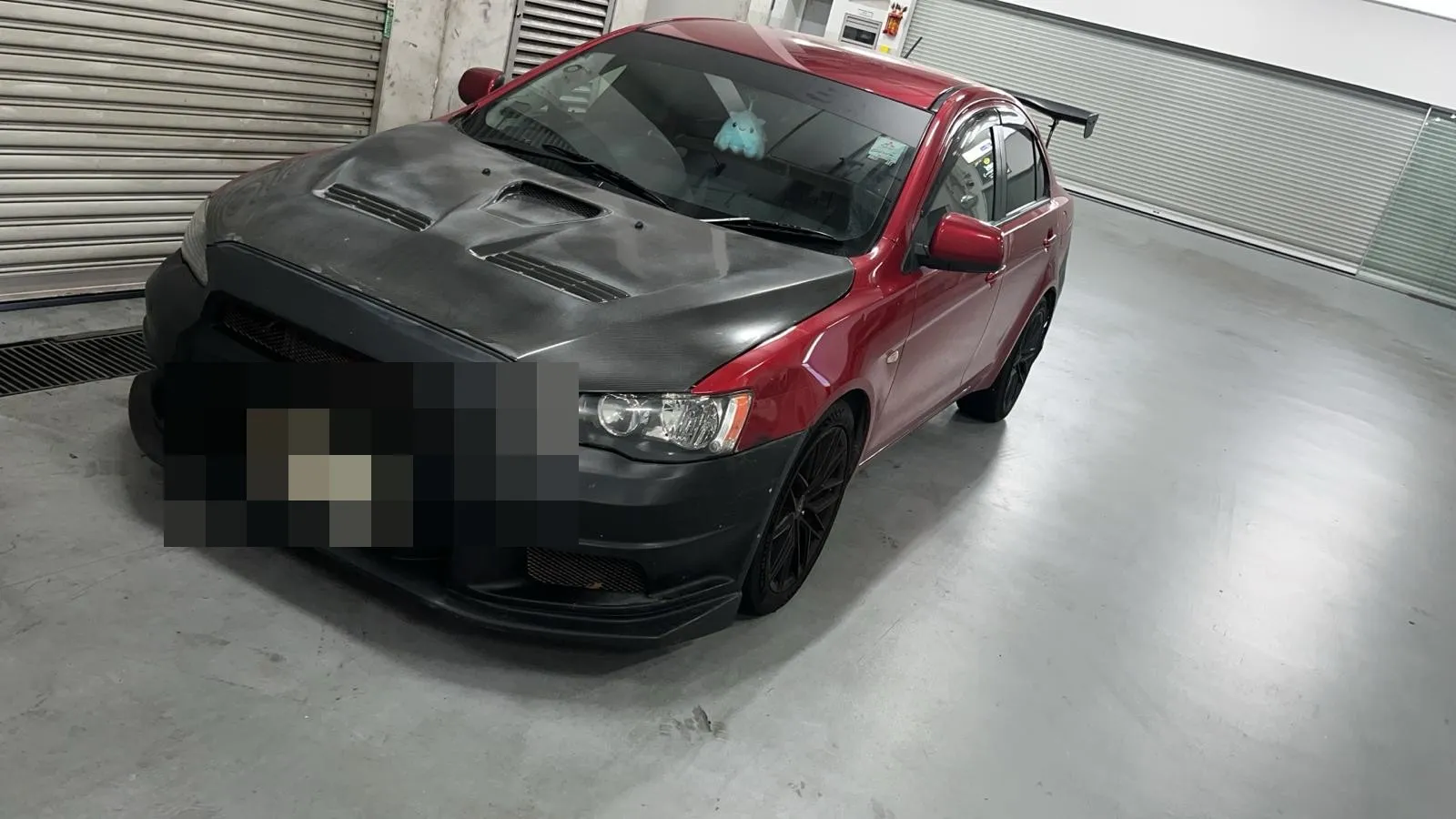 Mitsubishi Lancer Evolution in for servicing at our Singapore workshop