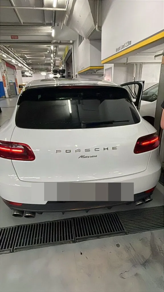 Porsche Macan at 1 Car Service Workshop with engine bay open for intake manifold replacement
