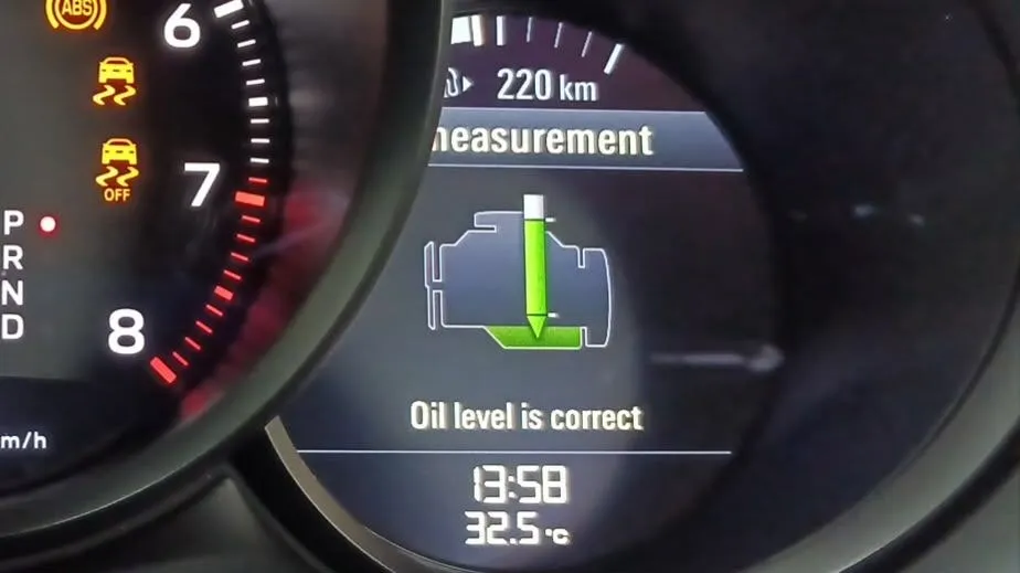 Porsche Macan PCM display showing Oil level is correct after major service at 1 Car Service Singapore