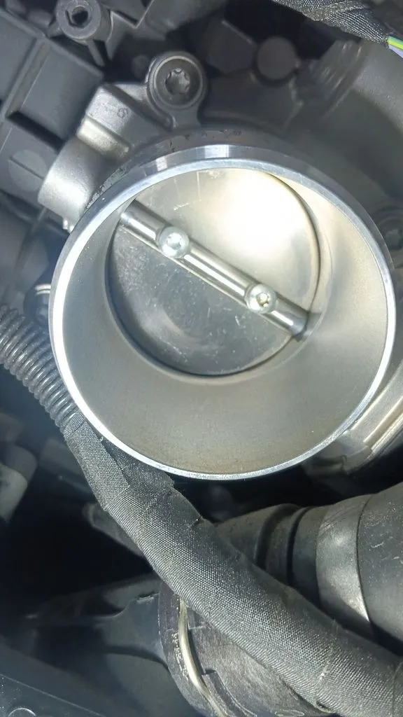 Porsche Macan throttle body after cleaning at 1 Car Service Singapore workshop