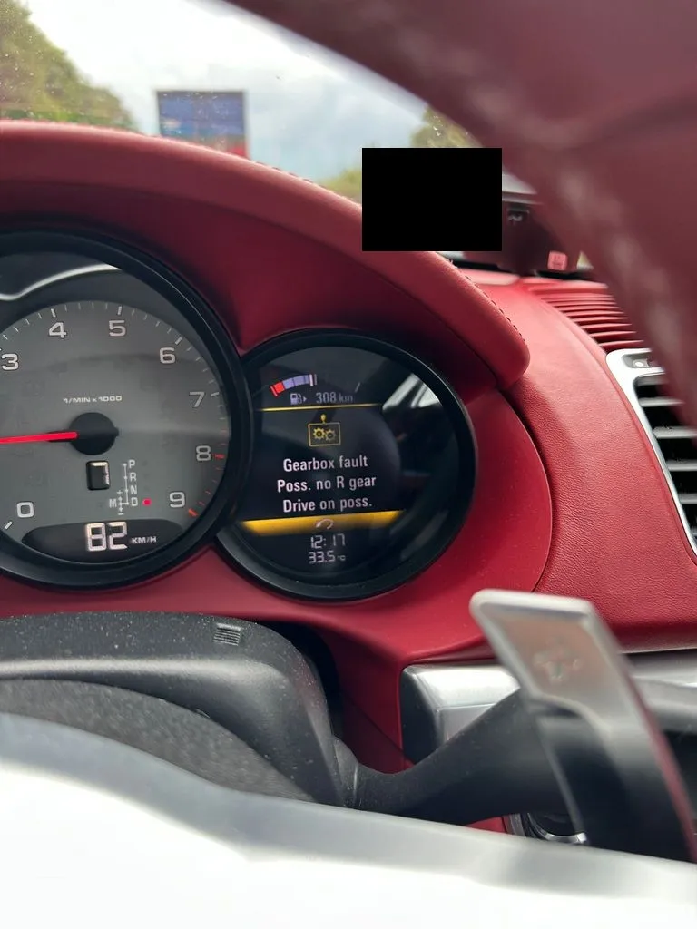 Porsche PDK gearbox fault warning shown while driving in Singapore