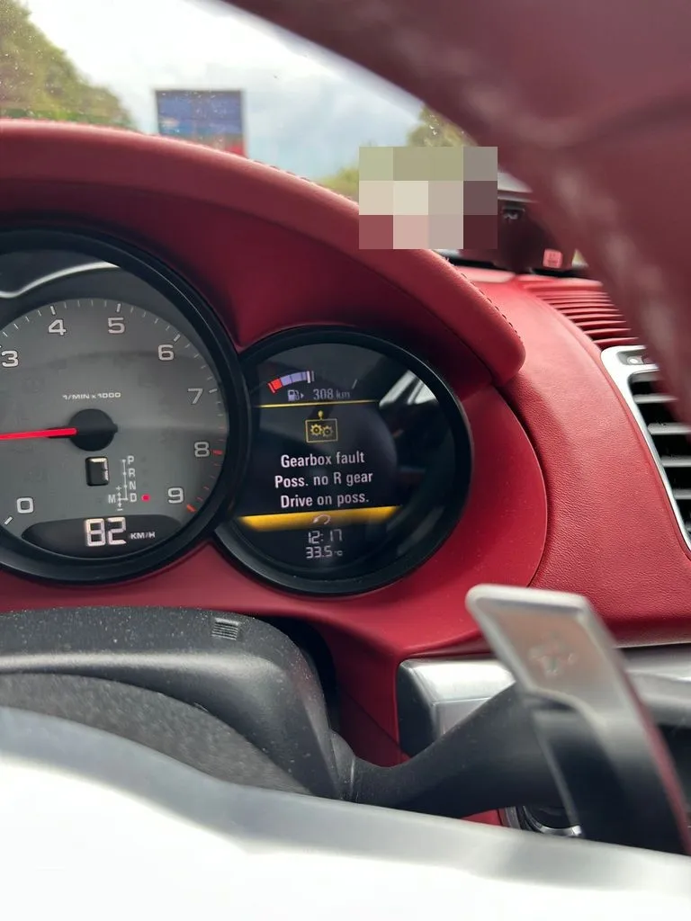 Porsche PDK gearbox fault warning shown while driving in Singapore