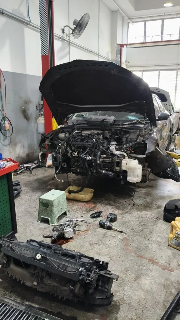 Skoda Octavia front end completely stripped at 1 Car Service Singapore for cooling system overhaul