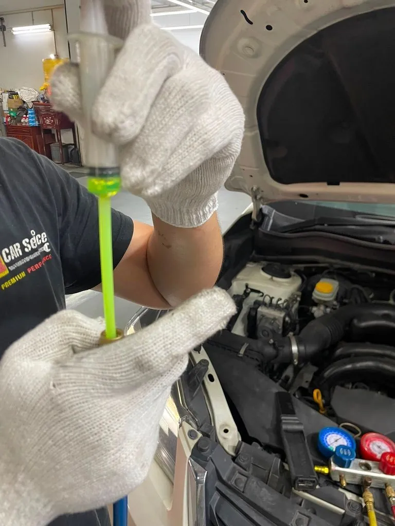 UV dye injected into the Subaru Forester A/C system to trace the compressor refrigerant leak