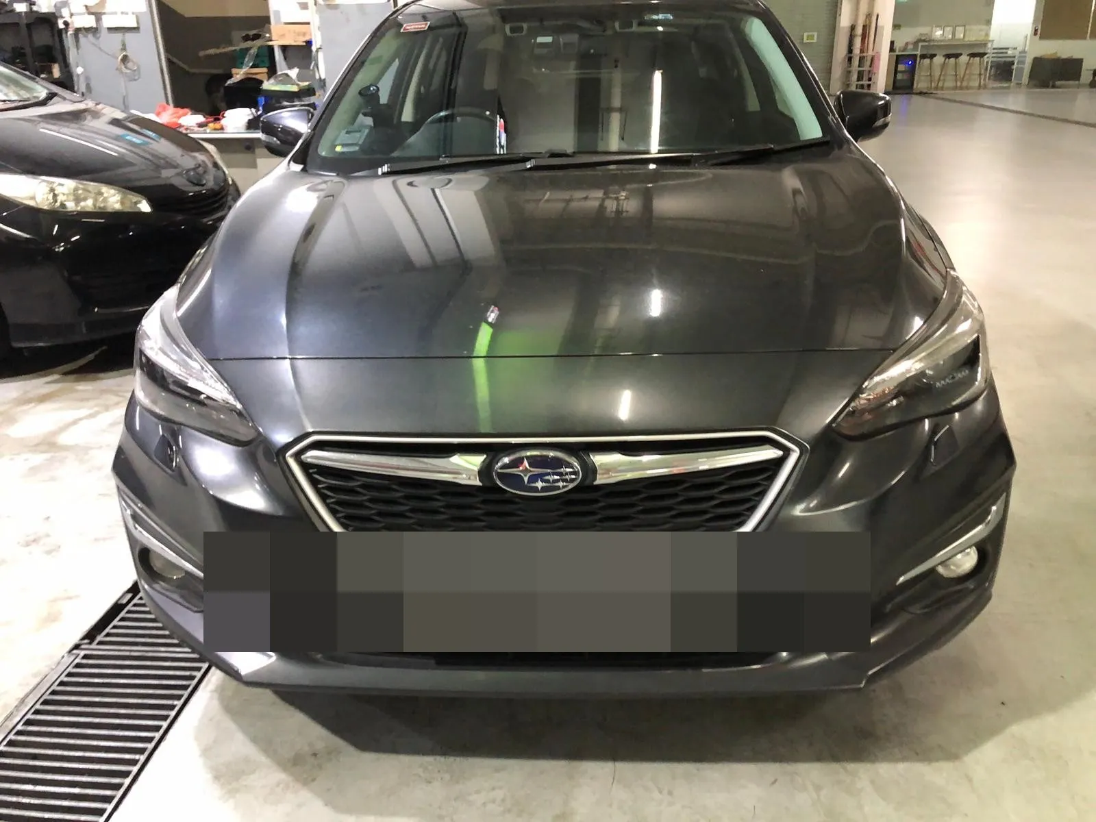 Subaru Impreza in for servicing at our Singapore workshop