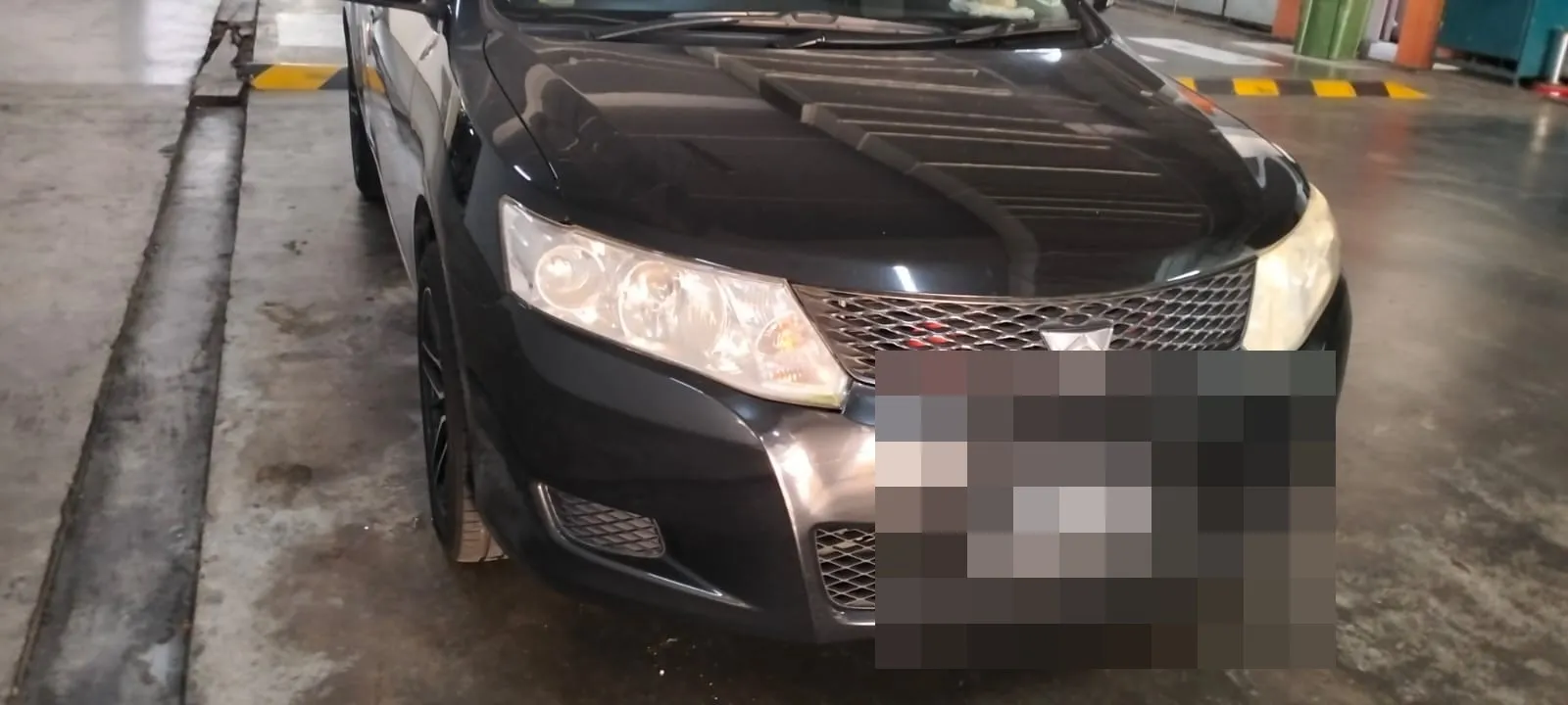 Toyota Allion in for servicing at our Singapore workshop