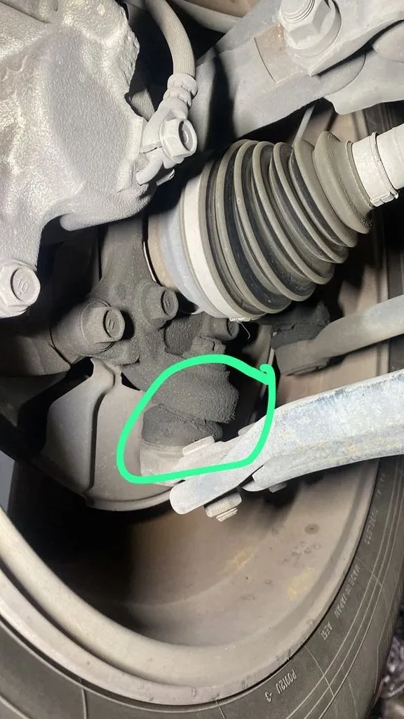 Toyota Harrier front lower ball joint boot circled in green during an undercarriage inspection at our Singapore workshop