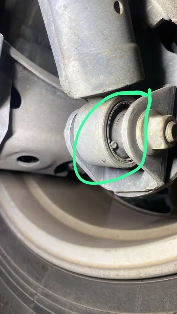 Toyota Harrier suspension bush circled in green during the inspection