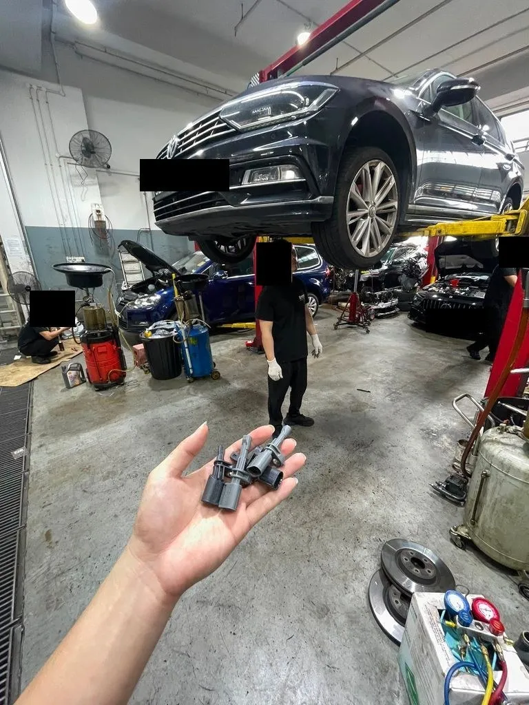 Old ABS wheel-speed sensors removed from a Volkswagen Passat during replacement at our Singapore workshop