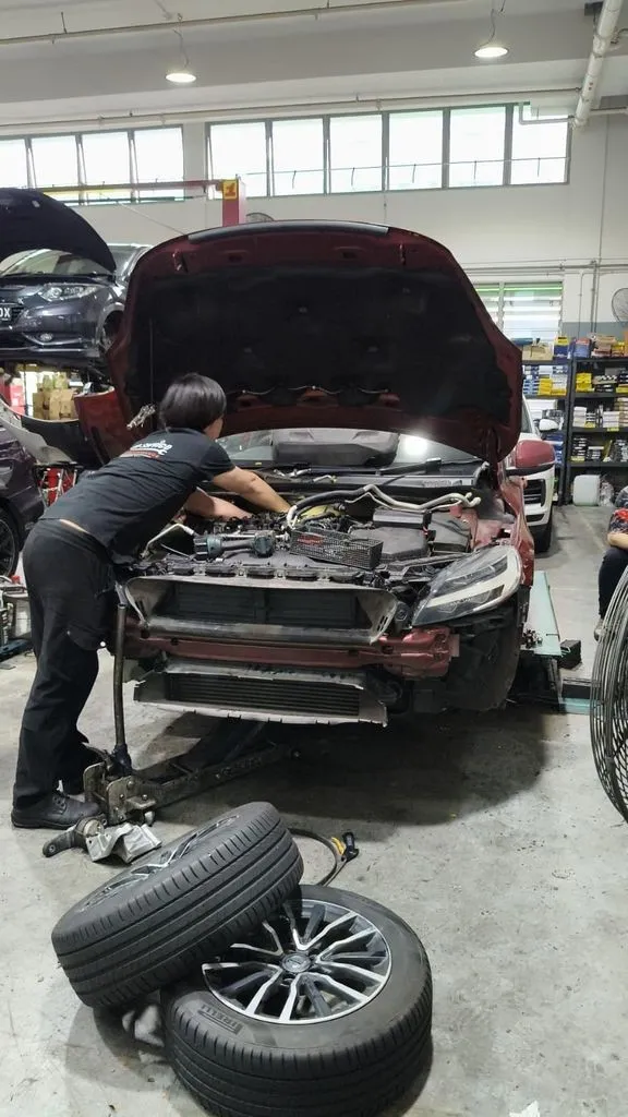 Red Volvo V40 at our Singapore workshop for aircon compressor seizure repair