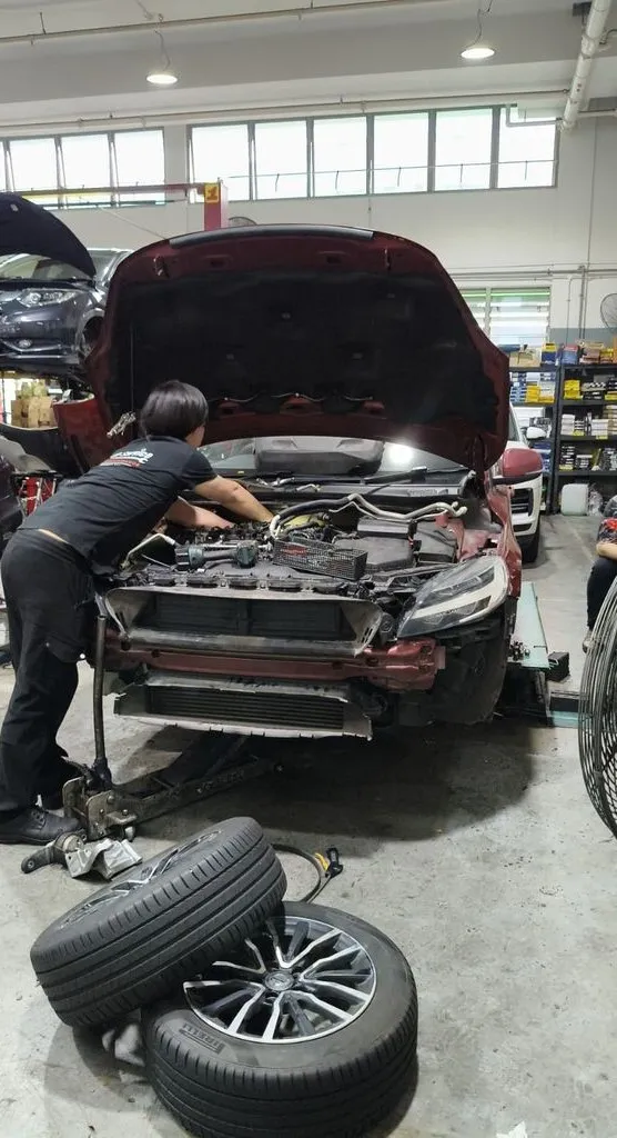 Red Volvo V40 at our Singapore workshop for aircon compressor seizure repair