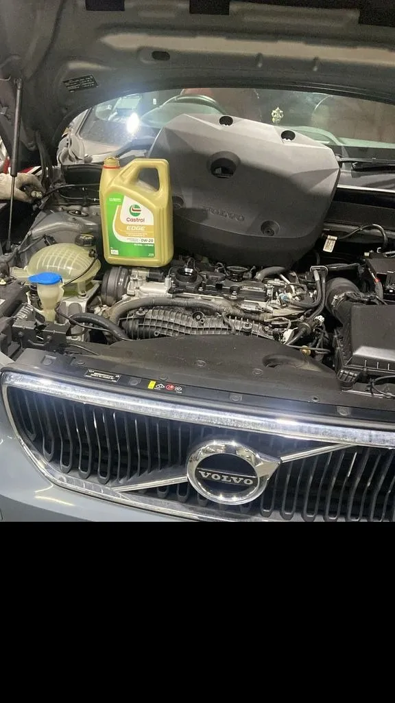Volvo engine bay during a major service at our Singapore workshop with the oil change in progress
