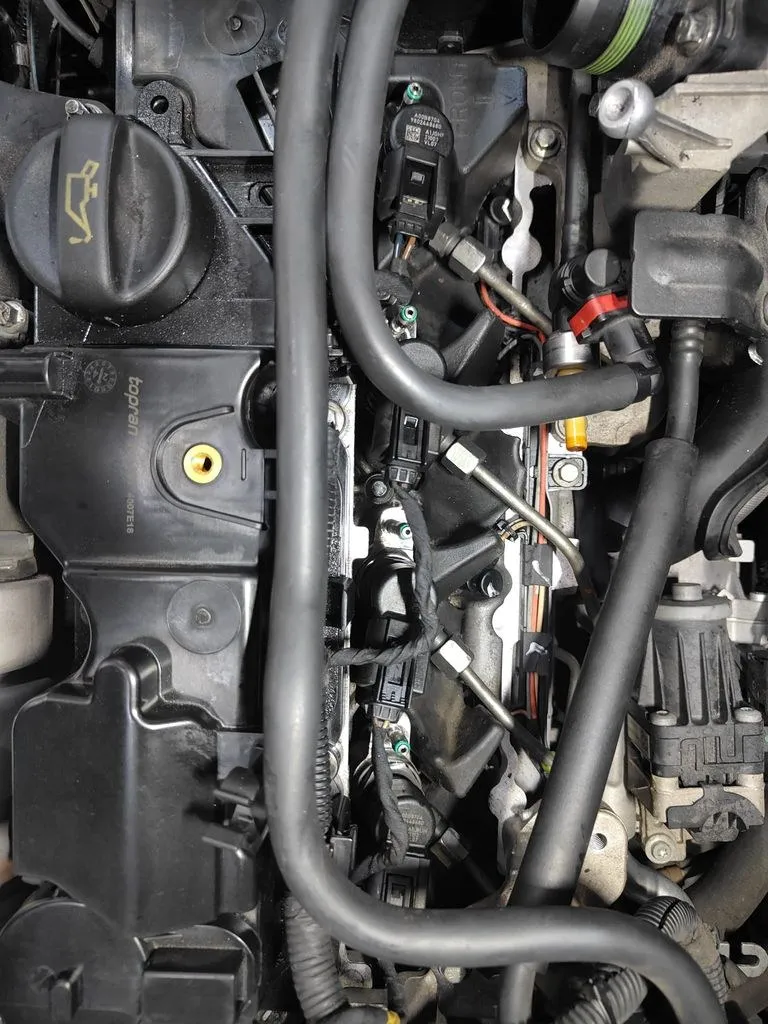 Volvo V40 engine bay at our Singapore workshop during a gearbox overhaul and fuel injector job