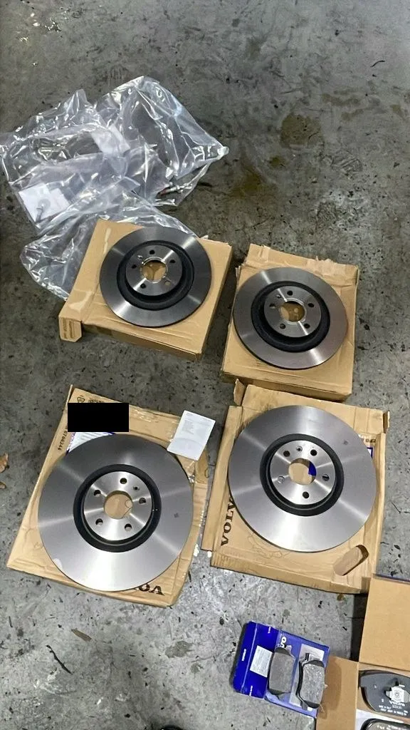 New Volvo XC40 front and rear brake disc rotors ready to replace worn brakes at our Singapore workshop
