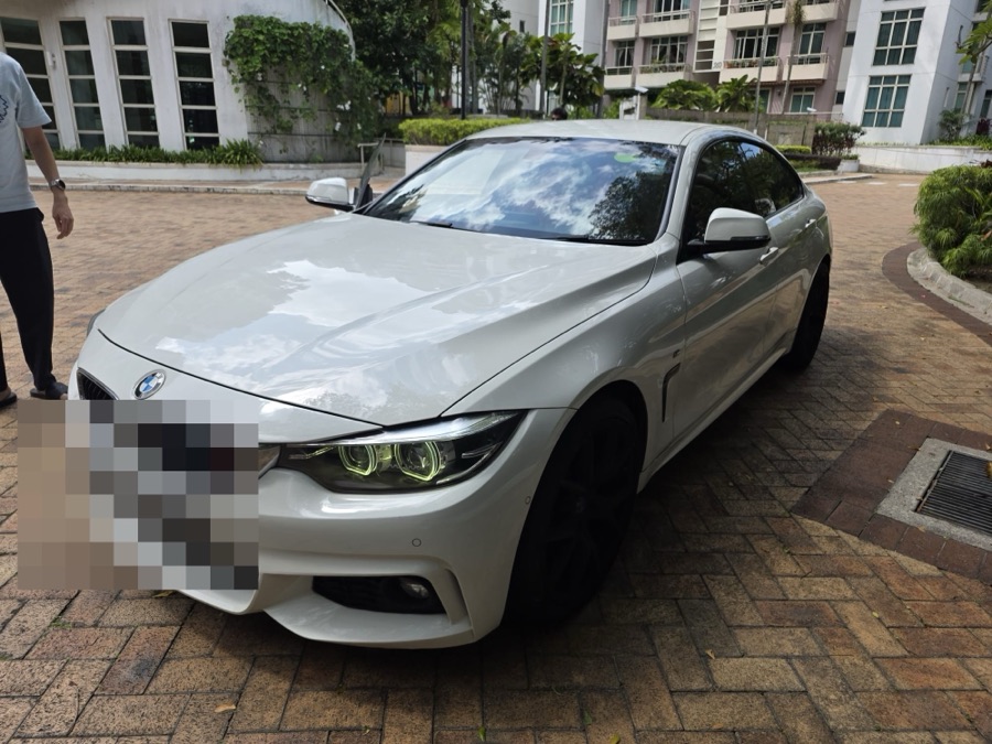 BMW 4 Series coupe parked ahead of workshop service