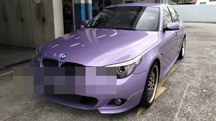 Purple BMW 5 Series sedan at our Singapore workshop