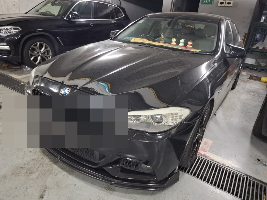 BMW 5 Series at our Singapore workshop for servicing.