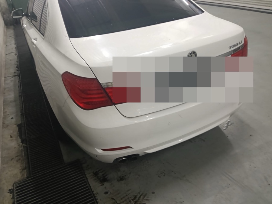 BMW 7 Series brought in for repair at our Singapore workshop.