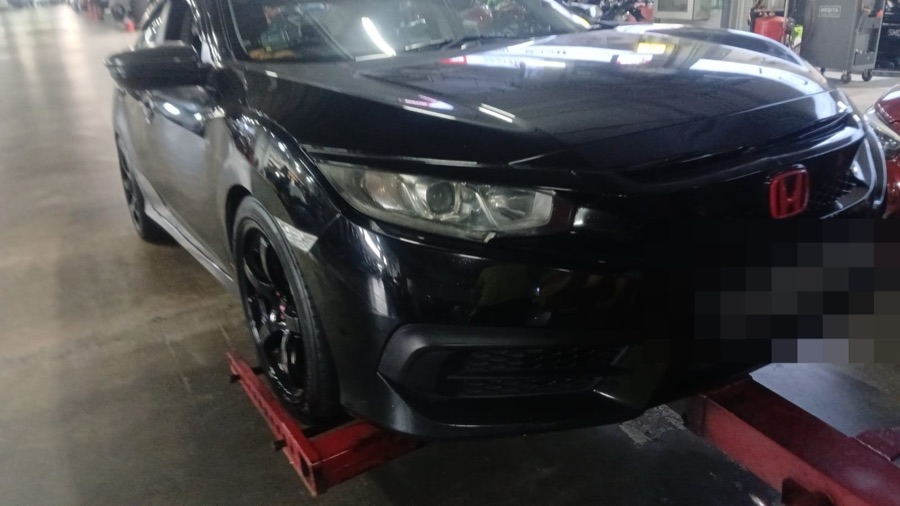 Honda Civic towed in for servicing at our Singapore workshop