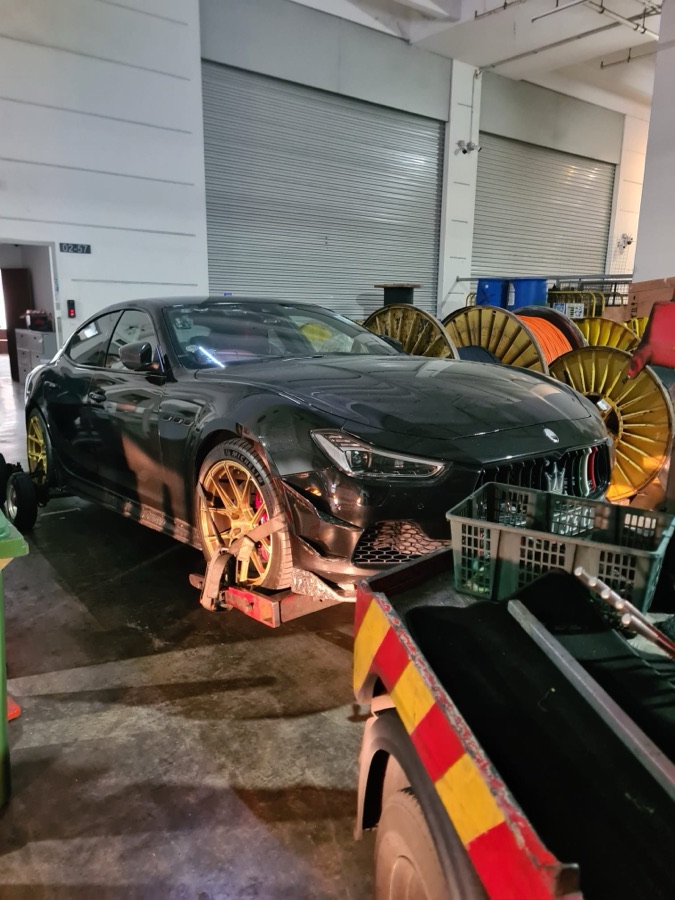 Maserati Ghibli on a tow dolly at our Singapore workshop
