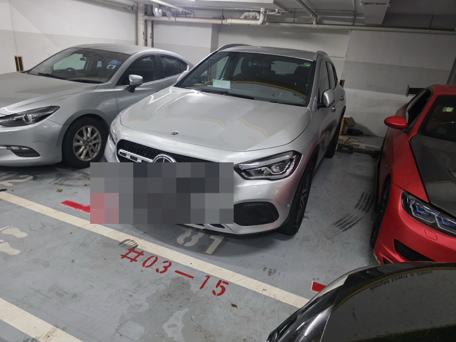 Mercedes-Benz GLA SUV parked in an indoor carpark, front view