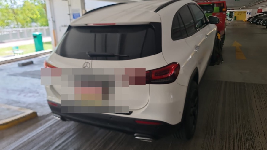 White Mercedes-Benz GLA SUV parked at our Singapore workshop