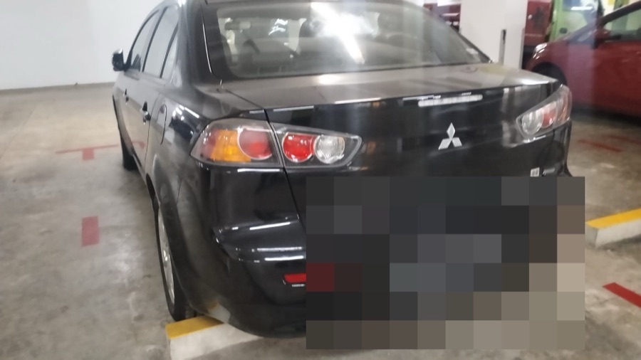 Mitsubishi Lancer EX rear view at our Singapore workshop